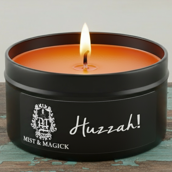 Huzzah candle with bright orange wax